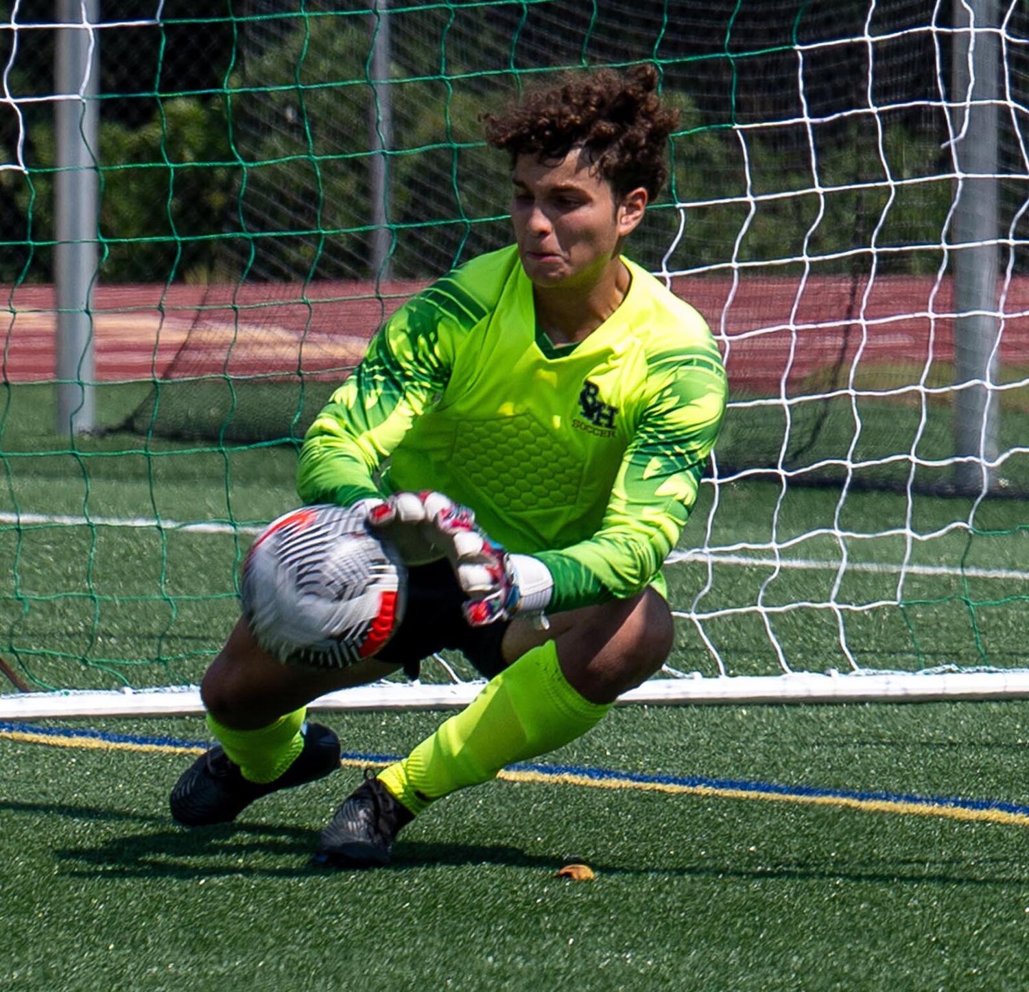 The Warwick Beacon’s Athlete of the Week is Bishop Hendricken soccer player Angelo Roca. Roca has emerged as arguably the state’s best keeper, recording three straight shutouts in net to help the Hawks improve to 6-1-1. (Photo by Leo van Dijk)